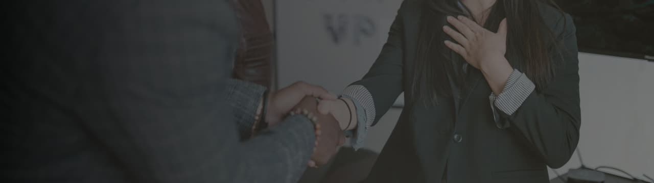 Handshake representing legal agreement in Las Vegas